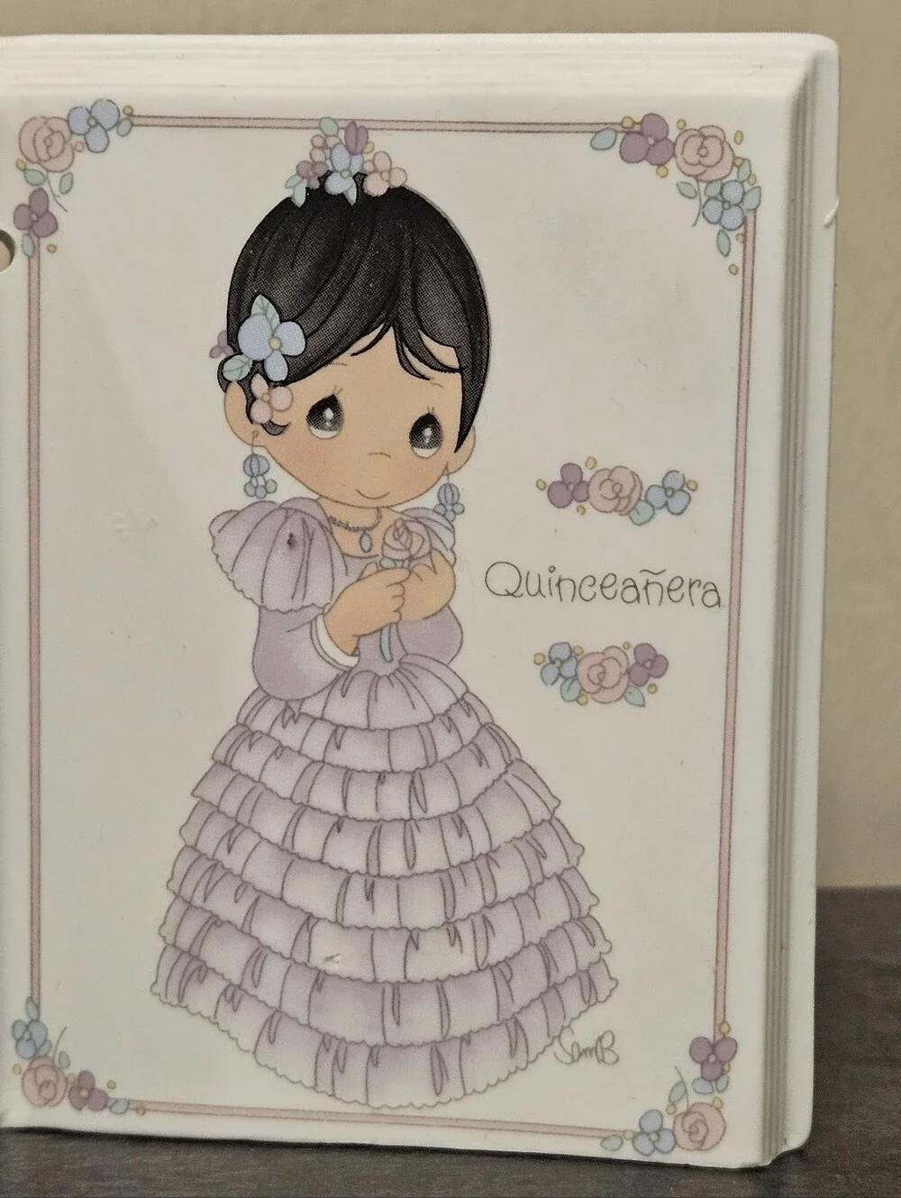 Precious Moments features teardrop